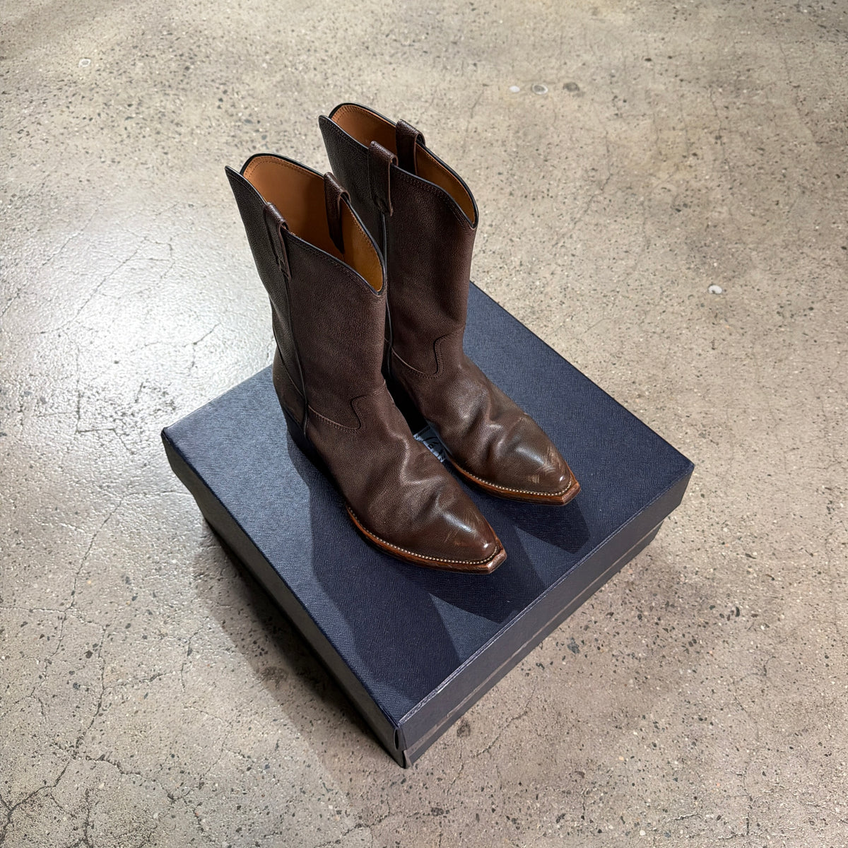 Prada Distressed Leather Cowboy Boots